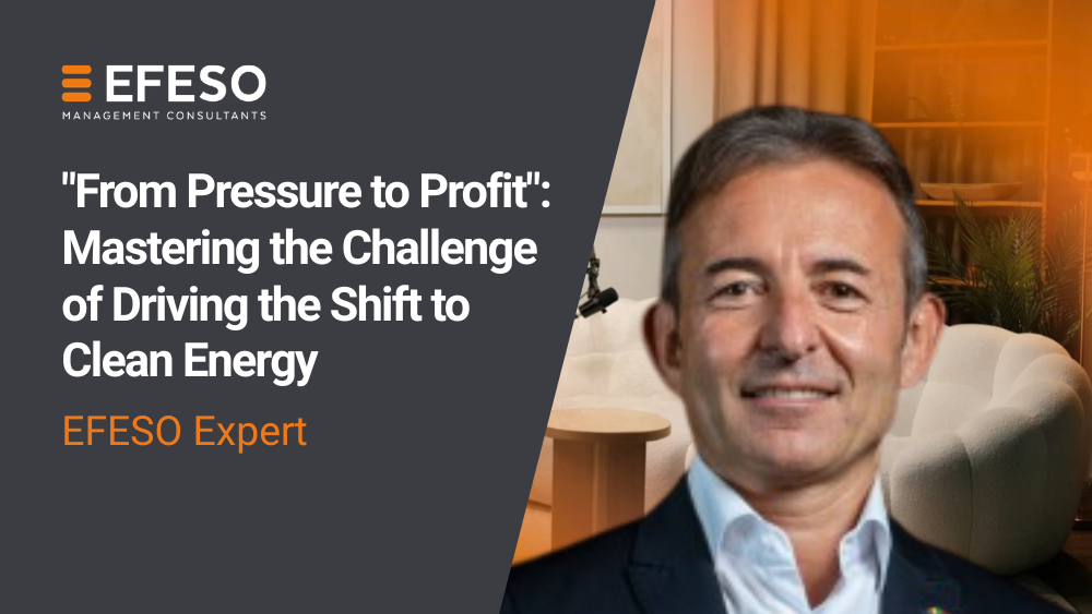 A smiling man in a suit stands in front of an orange and beige background. Text reads: From Pressure to Profit: Mastering the Challenge of Driving the Shift to Clean Energy. EFESO Expert. EFESO Management Consultants.. EFESO Management Consultants